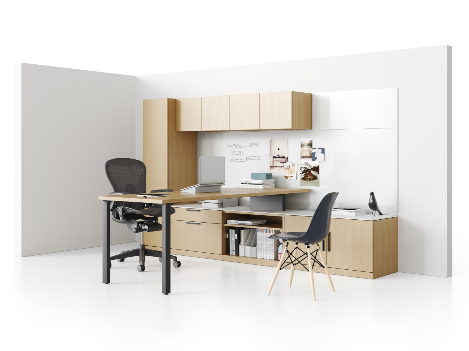 A Canvas Private Office featuring a peninsula desk and a credenza, tower, and overhead storage, all in a light wood finish.