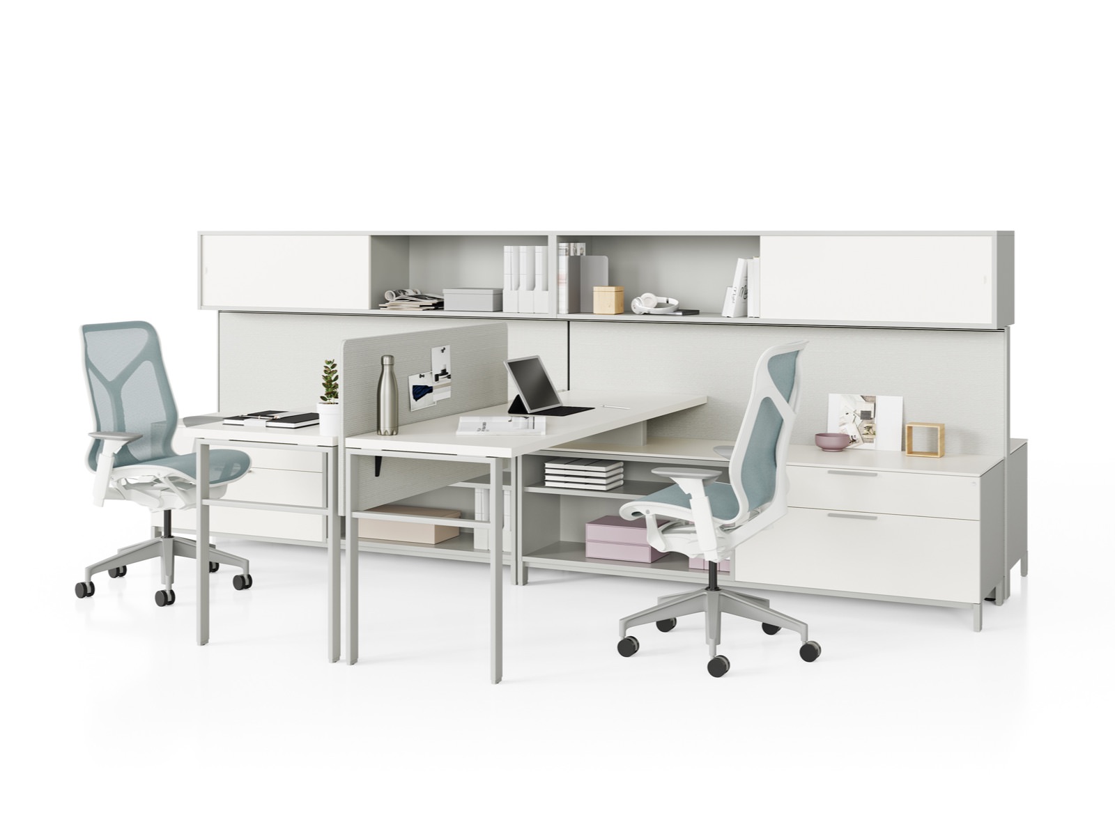 Two grey Canvas Wall workstations with white storage, surfaces, grey screens, and light blue Cosm Chairs.