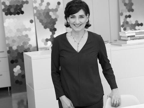 Select to learn more about Laura Guido-Clark’s design thinking and awards.