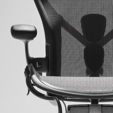 Close-up view of an Aeron Stool in Carbon.
