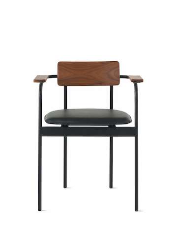A Betwixt Chair with a walnut backrest and arms with a leather seat. 
