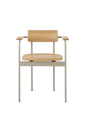 A Betwixt Chair with oak seat, backrest, arms and a grey frame. 