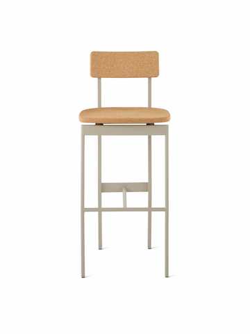 A bar height Betwixt Stool with a cork seat and backrest with a grey frame.