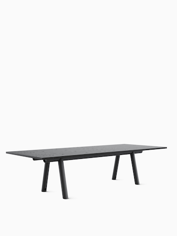 HAY Boa Table with black trestle base and ebonized oak rectangle top.