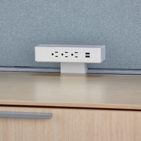 A close-up image of a power module on top of Canvas Dock storage.