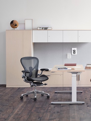 Canvas Office Landscape Wall storage units in a private office with Renew sit-to-stand desk and black Aeron Chair.
