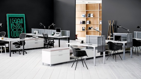 Canvas Storage application with white storage and black Aeron Chairs.
