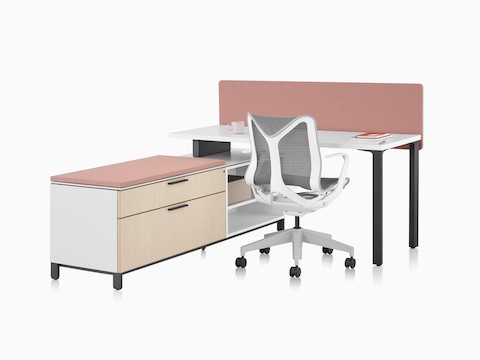 A Canvas Storage workstation with a white surface, pink screen, and grey Cosm office chair.