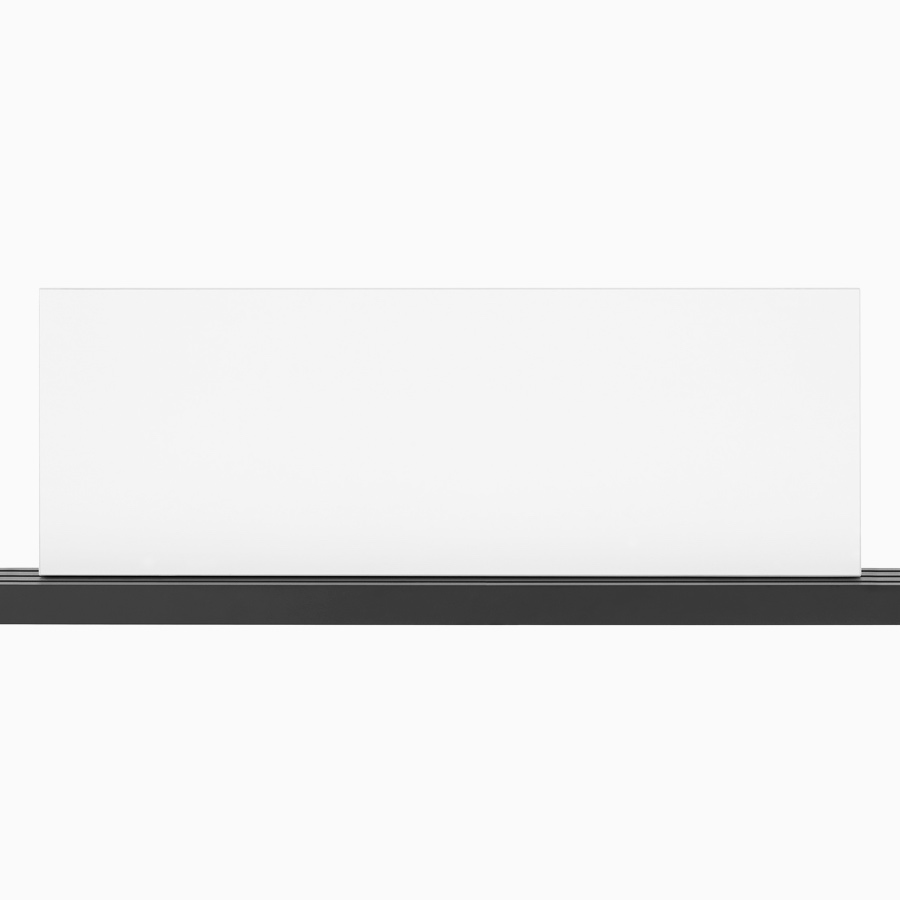 A white markerboard screen mounted on a black Canvas Vista power and data chase.