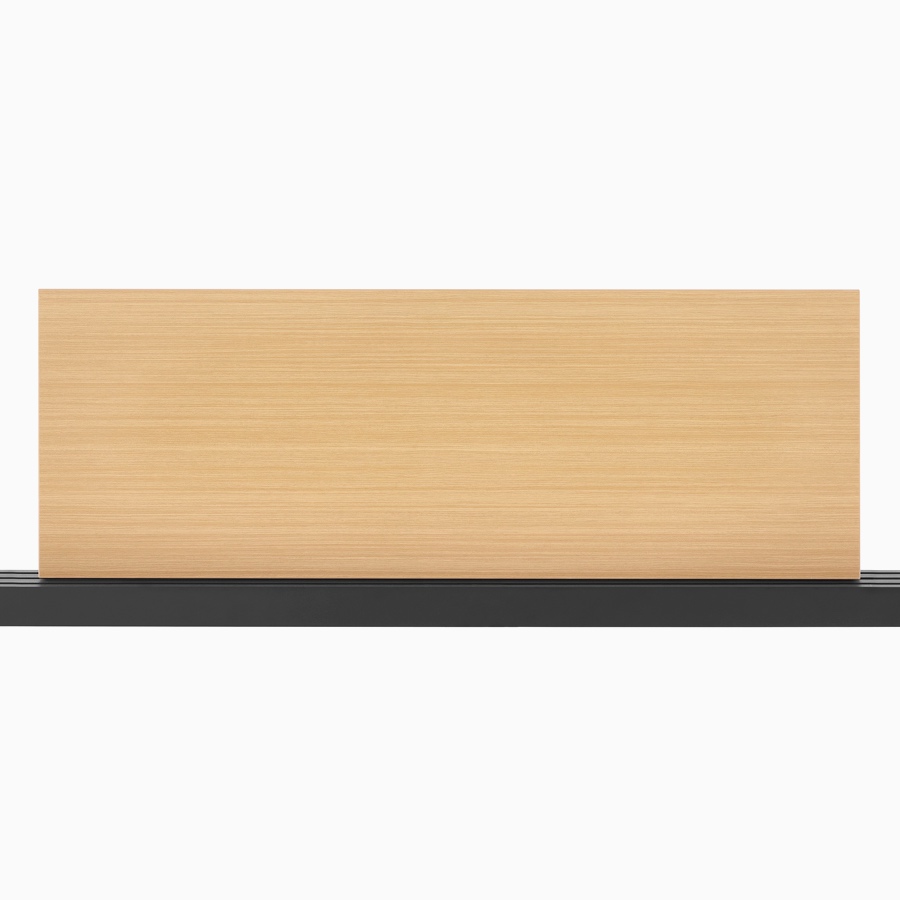 A light wood laminate screen mounted on a black Canvas Vista power and data chase.