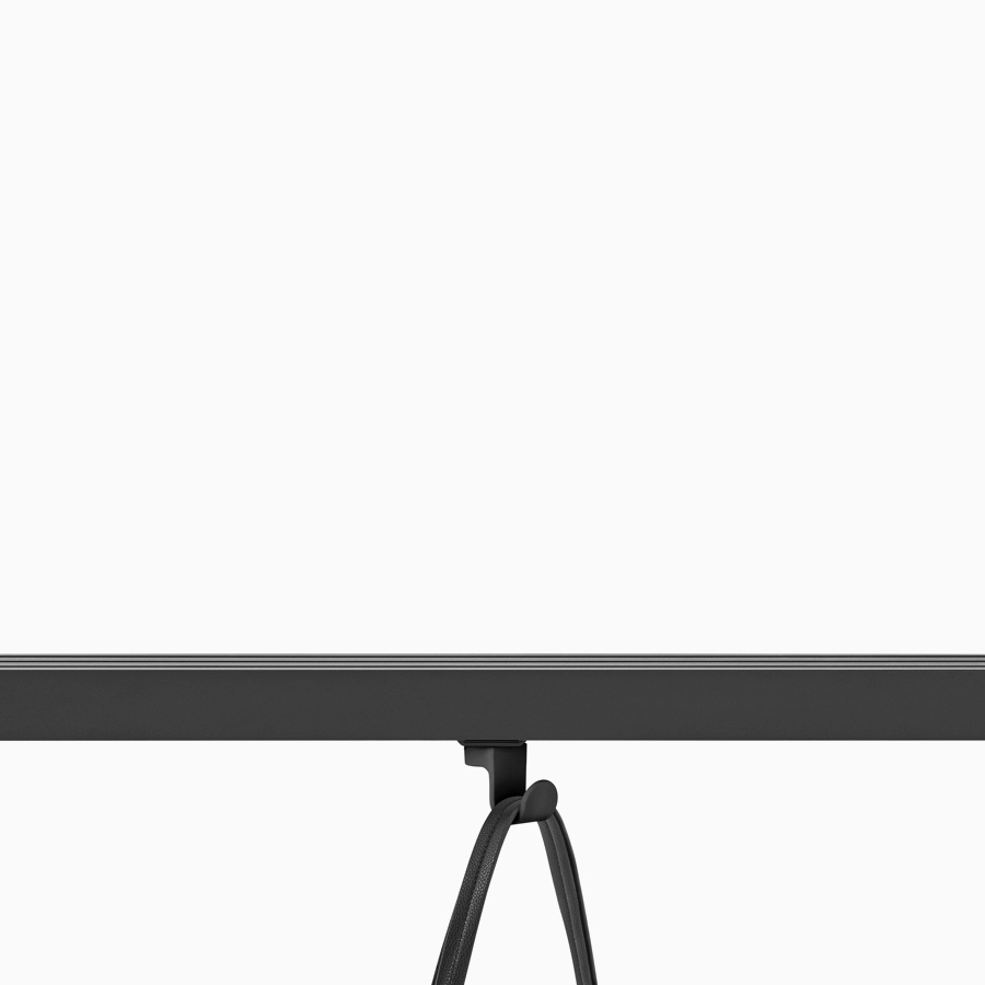 A black bag hook hanging from a black Canvas Vista chase.