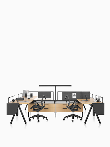 A Canvas Vista workstation with a-shaped legs, modesty screens, and black Cosm office chairs. Select to go to the Canvas Vista product page.