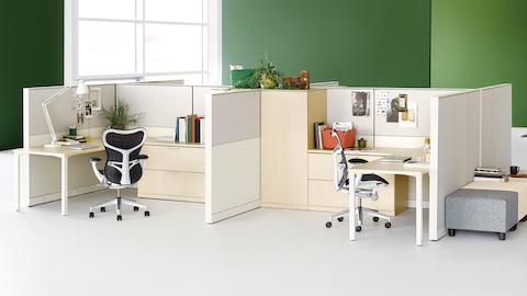 Two Canvas Wall workstations in light wood with black Mirra 2 office chairs.