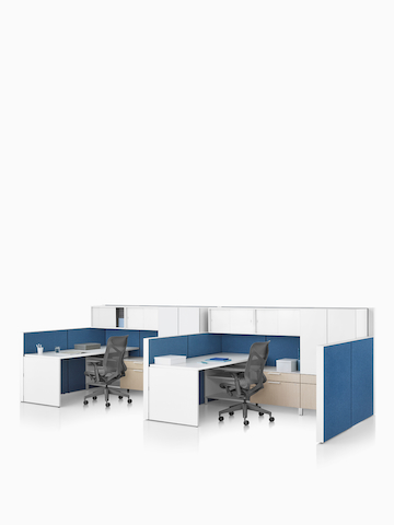A Canvas Wall workstation with blue panels and white overhead storage, and dark grey Cosm office chairs. Select to go to the Canvas Wall product page.