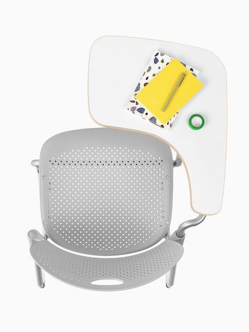 Overhead view of light gray Caper chair with a molded seat and tablet arm. 
