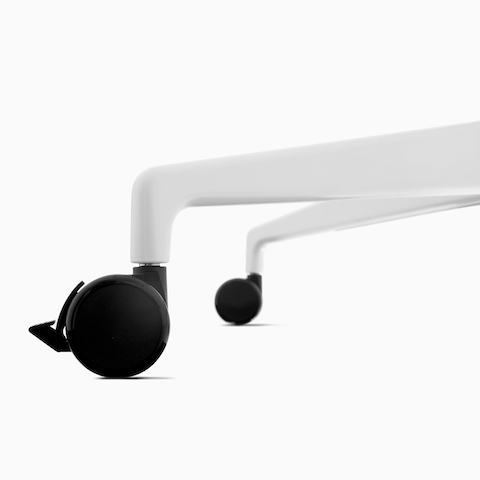 A close up view of a caster on a Civic Table base.