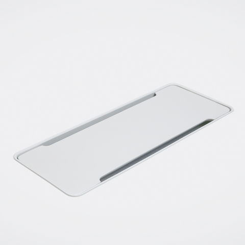 Detailed view of a large, closed access flap in a white table.