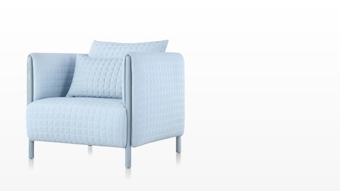 A light blue ColourForm lounge chair, viewed from a 45-degree angle. 
