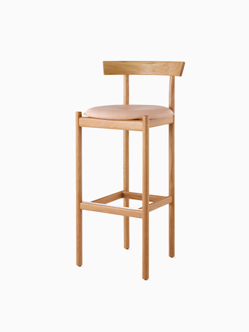 An oak bar-height Comma Stool. Select to go to the Comma Stool product page.