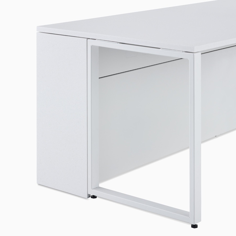 A close-up view of the 30 inch high structure option for prefab Commend Nurses Station supporting a work surface with a loop leg.