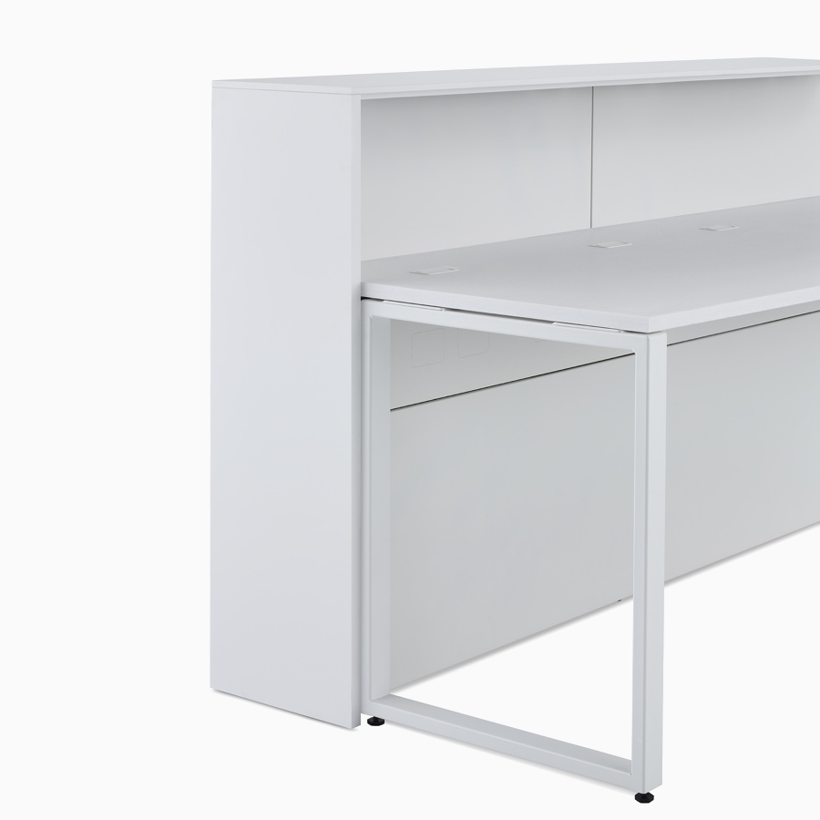 A close-up view of the 42 inch high structure option for prefab Commend Nurses Station providing a standing height boundary work surface with a loop leg.