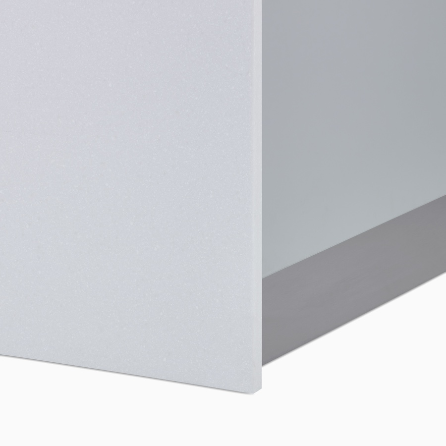 A close-up view of the brushed stainless steel finish toe kick providing durability and protection to prefab Commend Nurses Station.