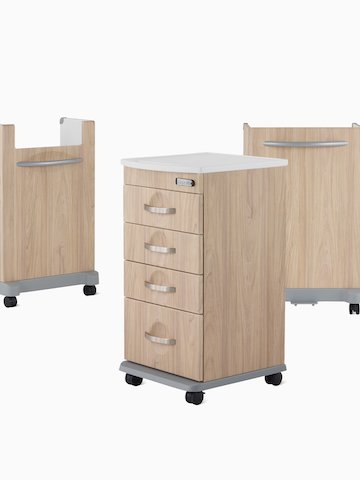 Compass casework carts, including a supply cart, a trash cart, and a linen cart in a warm elm finish.