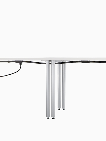 Connect Modular Power cables running beneath adjacent work surfaces. Select to go to the Connect Modular Power product page.