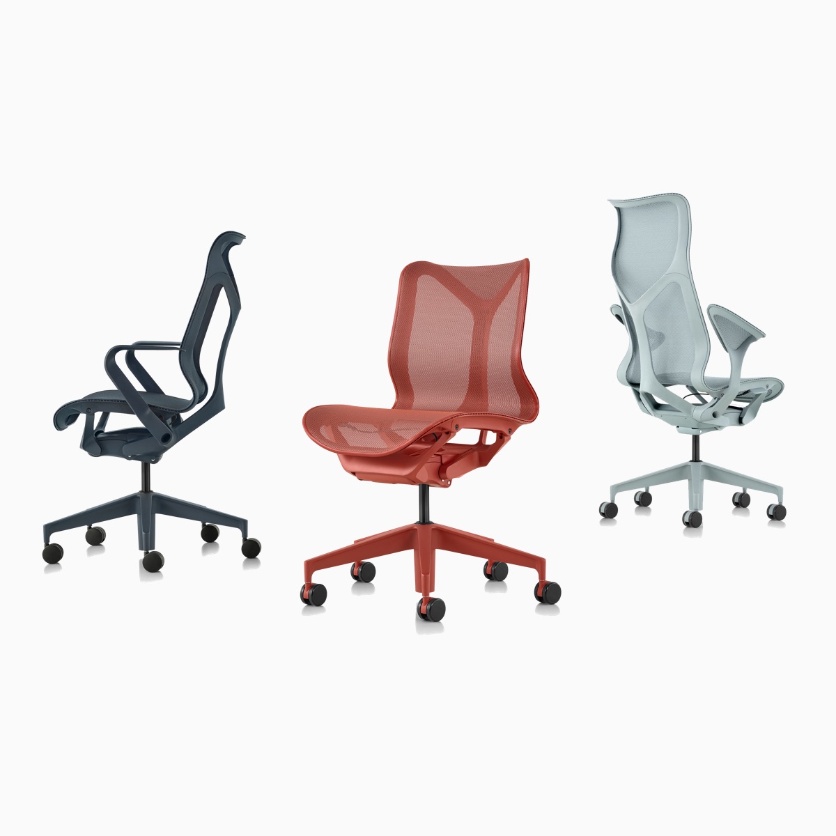 A grouping of Nightfall navy blue, Canyon red, and Glacier light blue Cosm Chairs.