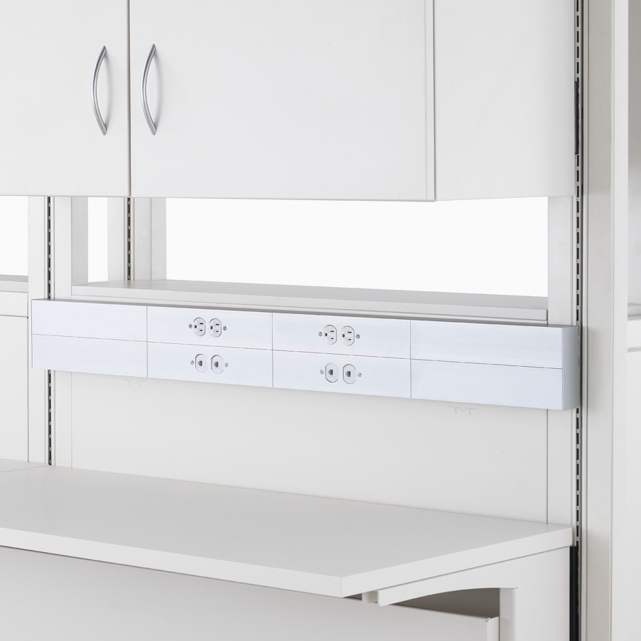 Detail of soft white Co/Struc System frame module with power and data channel access.