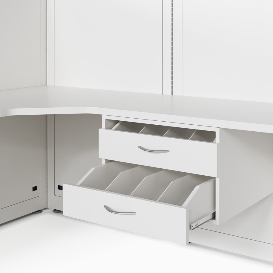A close-up detail of a Co/Struc bottle drawer with two drawers and attached under a work surface that's attached to a wall frame in a soft white finish.