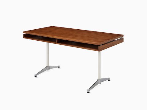 An Eames 2500 Series Executive Desk in walnut with white legs. 24 x 48