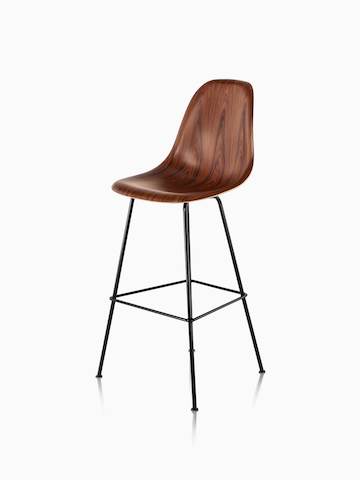 Eames Molded Wood Stool. Select to go to the Eames Molded Wood Stool product page.