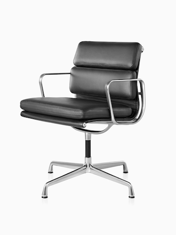 Black Eames Soft Pad Chair. Select to go to the Eames Soft Pad Chairs product page.