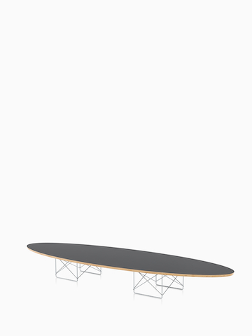 An Eames Wire Base Elliptical Table with a gray top. Select to go to the Eames Wire Base Elliptical Table product page. 