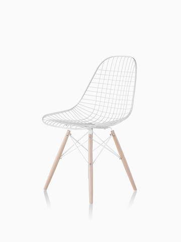 White Eames Wire Chair with light wood dowel base. Select to go to the Eames Wire Chairs product page.