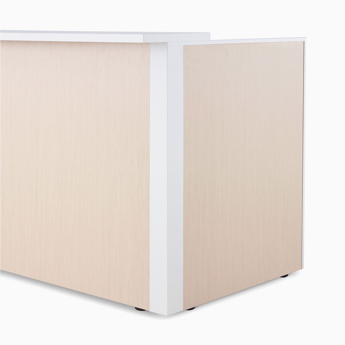Detail of Ethospace Nurses Station in a light wood finish featuring the outside corner and transaction surface.