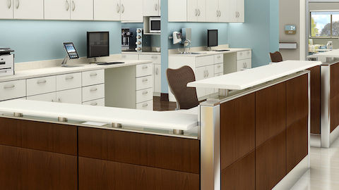 Two healthcare workstations configured from Ethospace Nurses Station storage and surface elements.