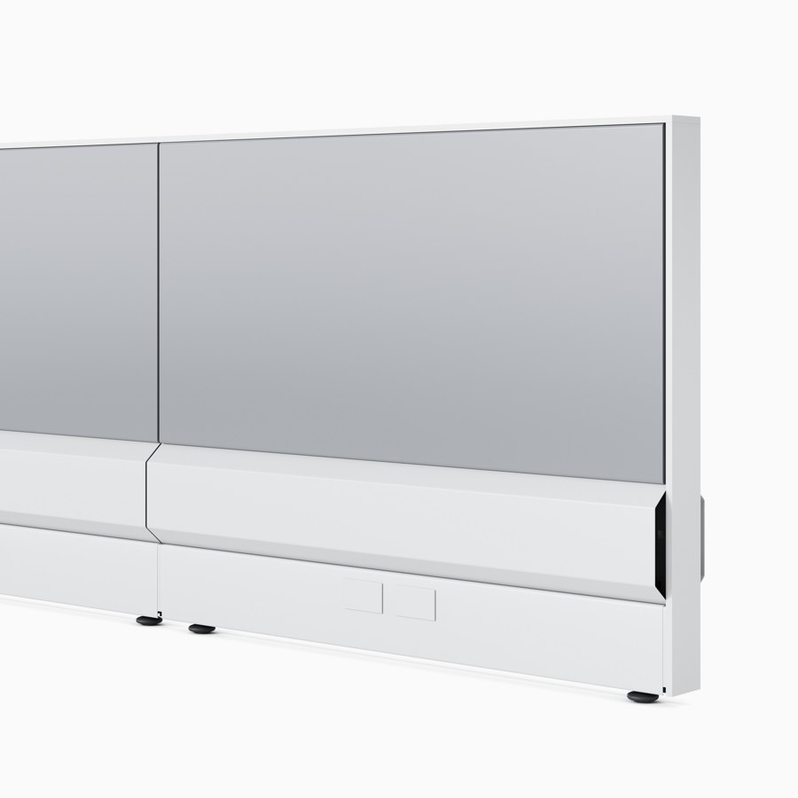 Ethospace wall in white trim and light gray tiles with a large cable management tile at the bottom in a soft white finish.