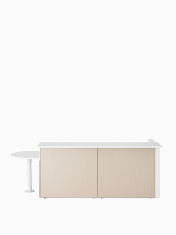 Ethospace Nurses Station in a light wood finish with transaction surface and ADA peninsula surface in white.