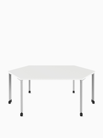 Two white trapezoid Everywhere Tables positioned back to back.
