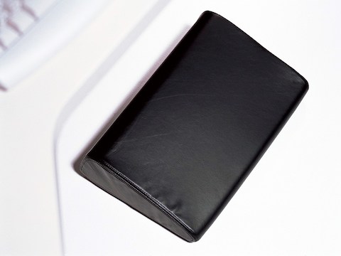 Overhead view of a black Foot Pillow.