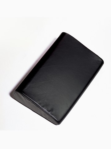 A black Foot Pillow. Select to go to the Foot Pillow product page.