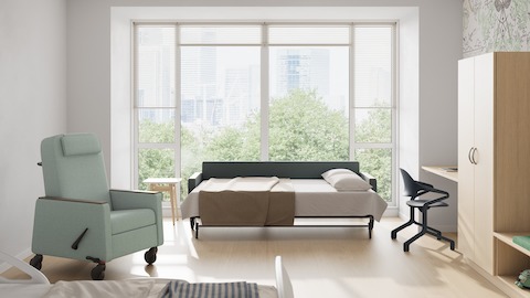 Gemma Recliner and Gemma Double Sleep Sofa in open position in a patient room.