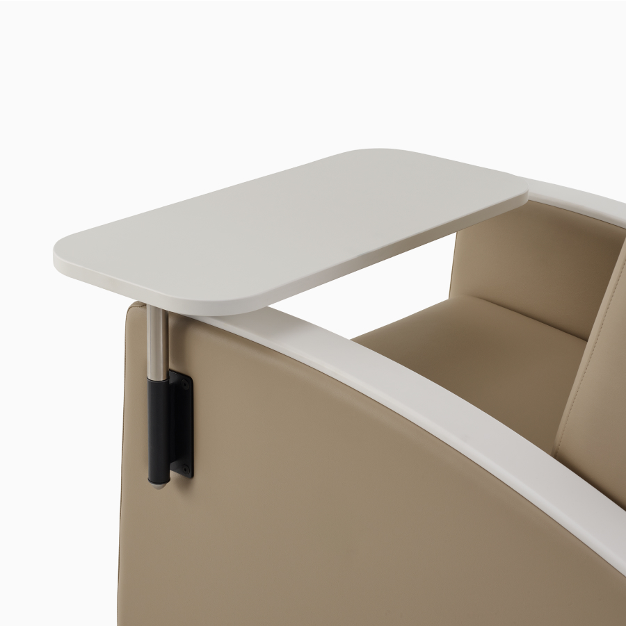 Adjustable tray table on Gemma Recliner.