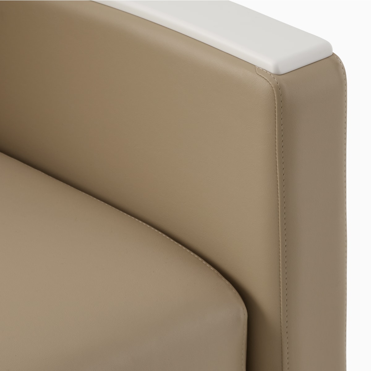 Detail showing armrest and seat cushion designed for easy clean-out on Gemma Sleep Chair.