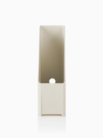 A vertical desktop holder containing reference materials.