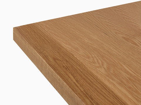 A detailed view of the Land Table's oak top.