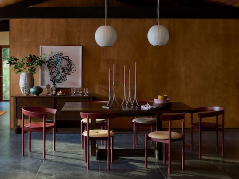 Land Table in oak with red Comma chairs surrounding, and Heath earthenware on top.