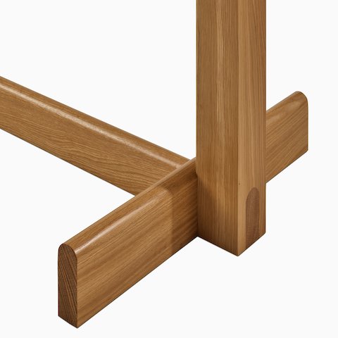A detail view of Land Table's oak leg.